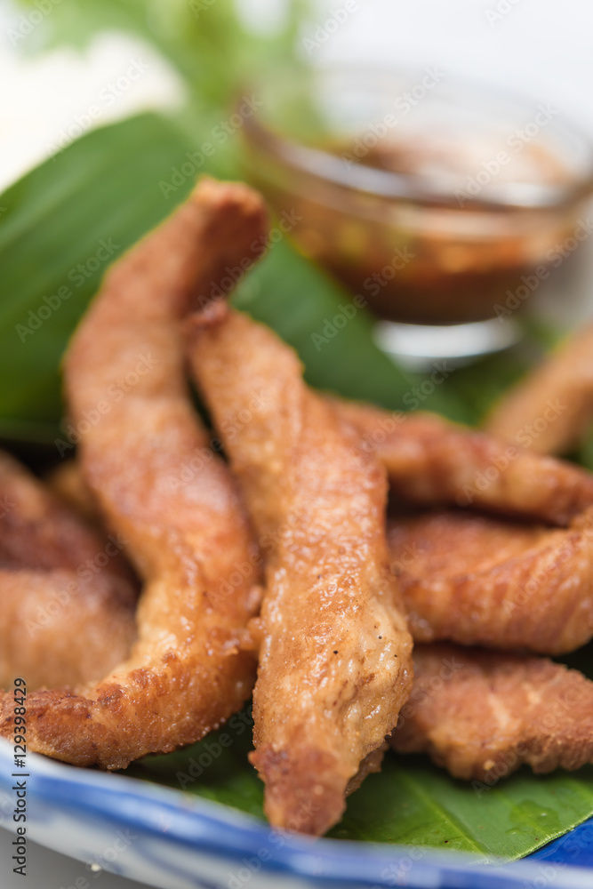 Fried pork,treadition Thai menu set on banana leaf Fried pork,treadition Thai menu set on banana leaf