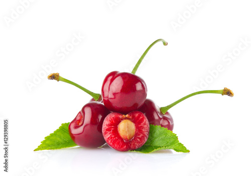 Ripe juicy cherry with green leaf