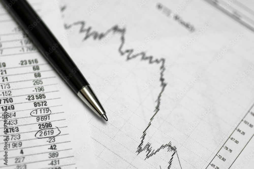 pen on paper with the price quotes and charts pen on paper with the price quotes and charts