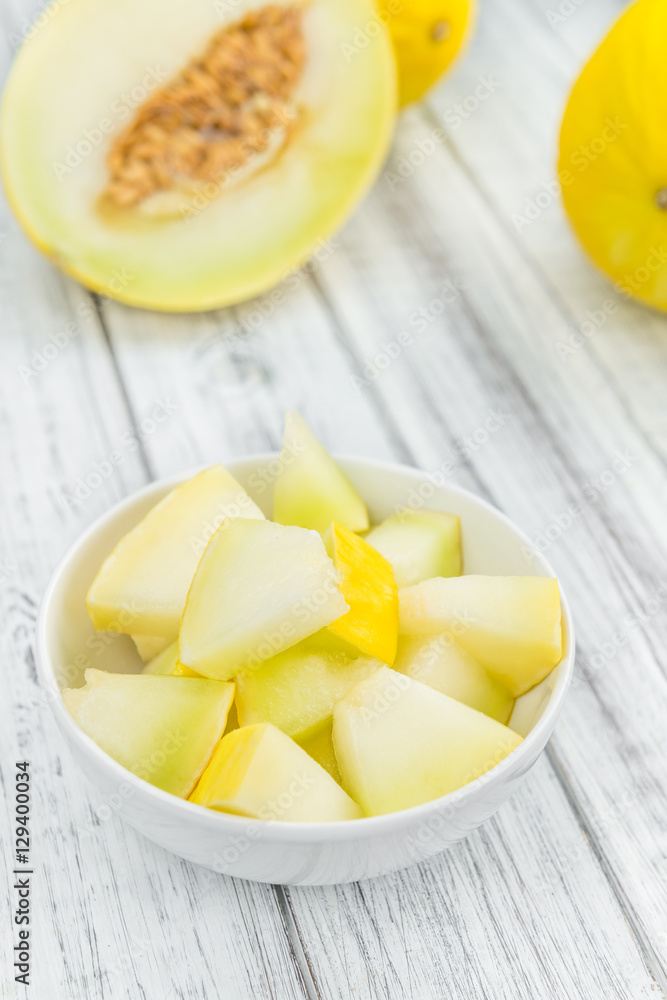 Wooden table with Honeydew Melon (selective focus) Wooden table with Honeydew Melon (selective focus)