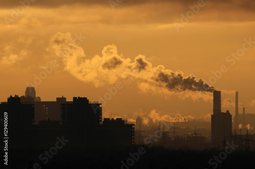Smoke from industrial chimneys at dawn © Николай Григорьев