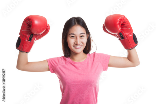 Young Asian woman with red boxing gloves.