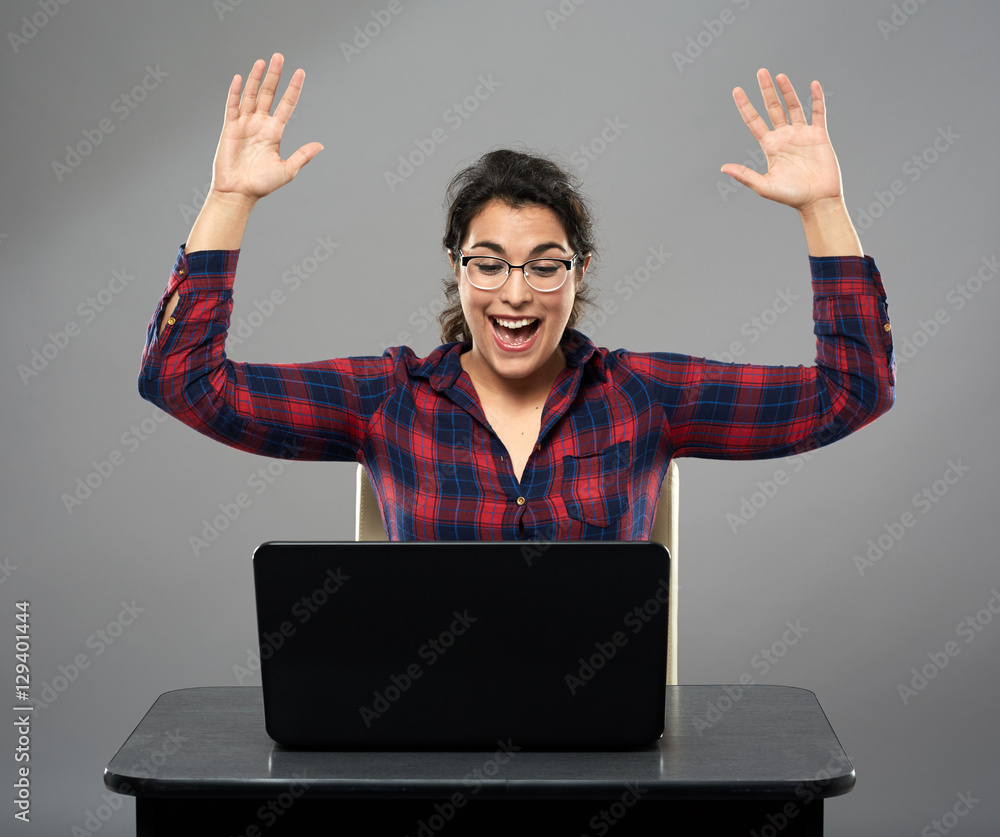 Happy businesswoman at her computer Happy businesswoman at her computer