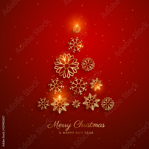 stylish golden christmas tree design made with snowflakes