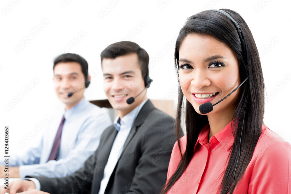 Smiling call center (or telemarketer) staff Smiling call center (or telemarketer) staff