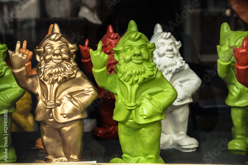 Gnomes showing middle finger in the store window in Bruges, Belgium