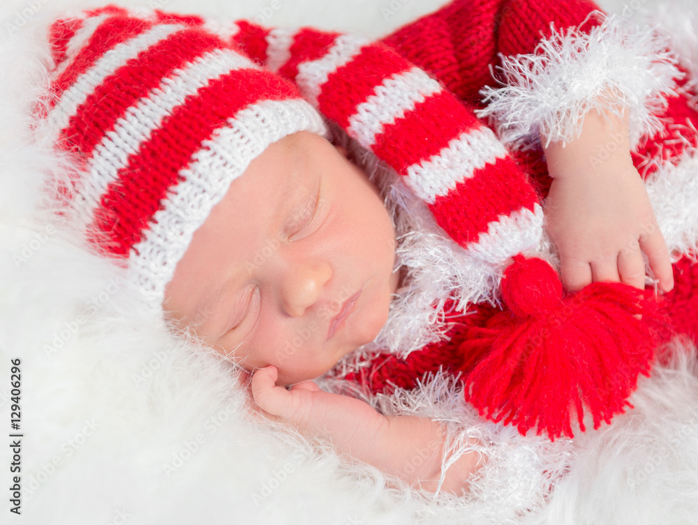 sweet sleeping baby in red santa hat, closeup sweet sleeping baby in red santa hat, closeup