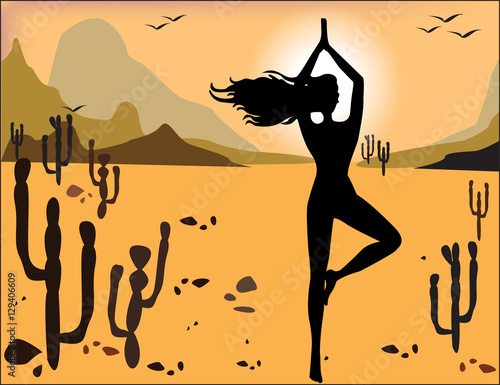 Silhouette of a girl in yoga pose on the background of the deser