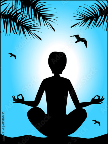 silhouette of a man in a yoga pose on a blue sky background