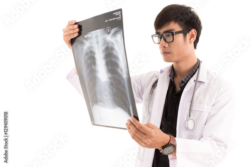 Young asia doctor check x-ray isolated on white. Asian male mode