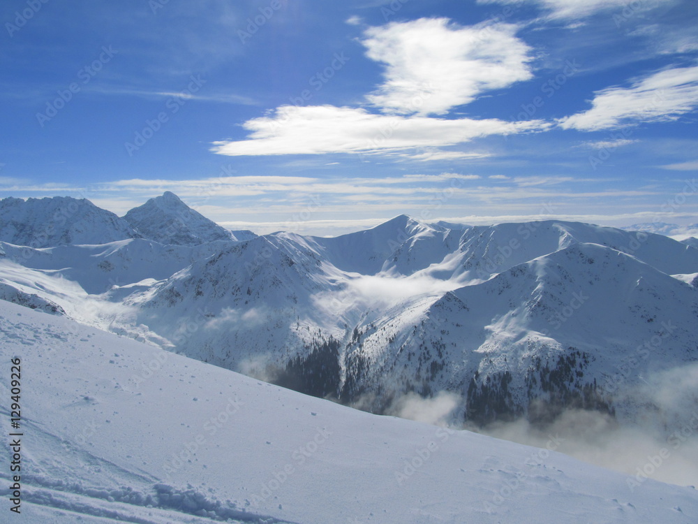 Panoramic view on winter mountains