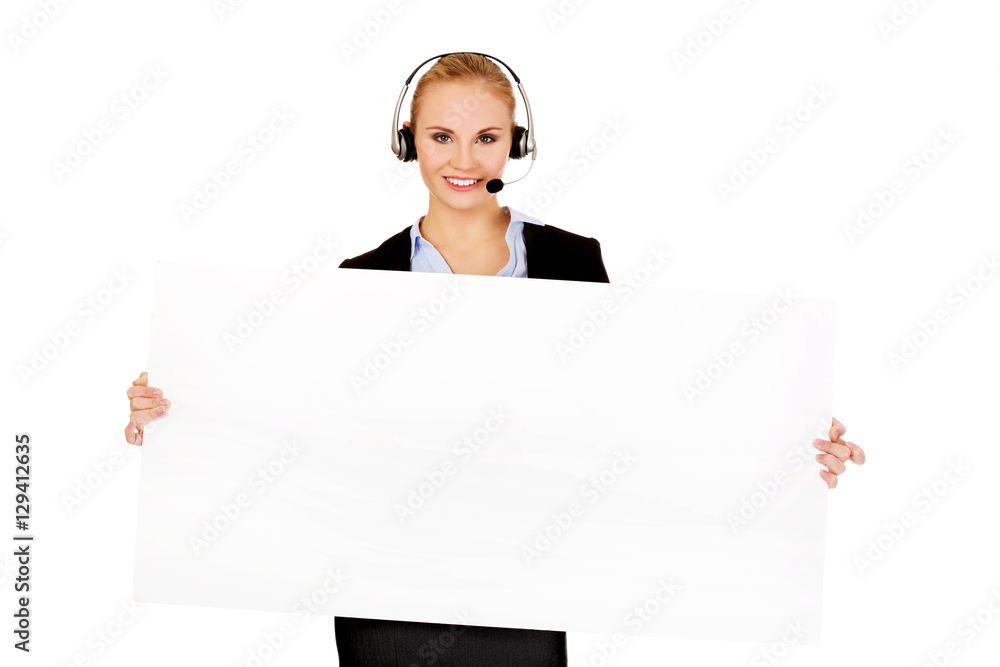 Smile call center woman holding empty banner Smile call center woman holding empty banner