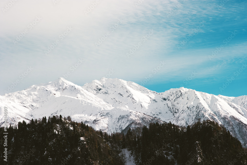 Snowy Mountains and blue sky with clouds Winter Landscape Travel serene scenic view