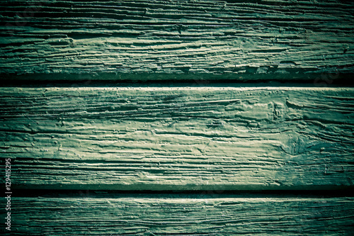 Empty wooden wall. Dark green wood panel background. Hardwood planks with nice grunge texture and copy space.