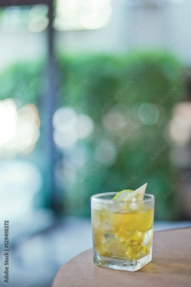 Close up of lemonade juice. Blurred background.
Close up of lemonade juice. Blurred background.