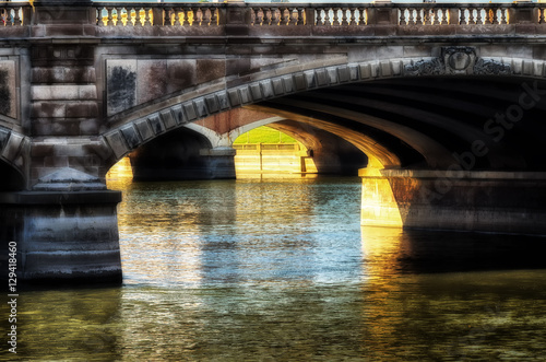 Arched bridge on the river © DavidMohn