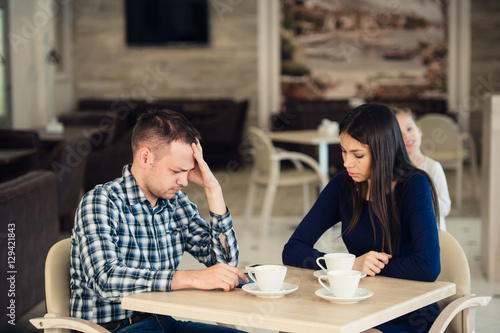 Принти на полотні Young couple arguing in a cafe