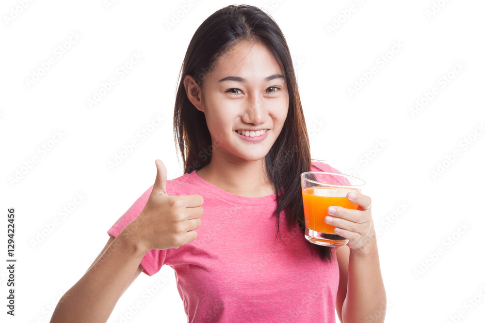 Young Asian woman thumbs up drink orange juice.