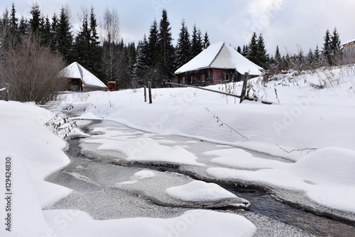 Mountain wooden chalet covered with fresh snow © salajean