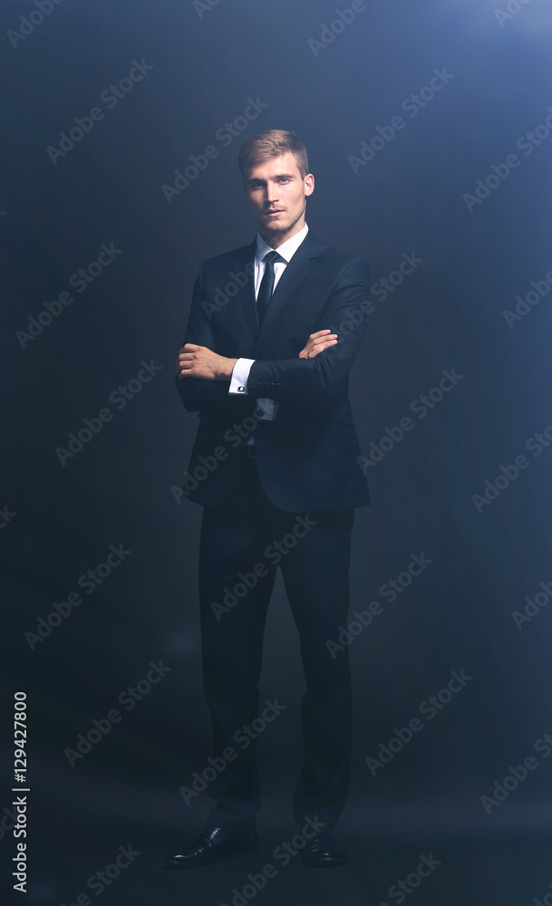 portrait of successful happy businessman in a gray business suit portrait of successful happy businessman in a gray business suit
