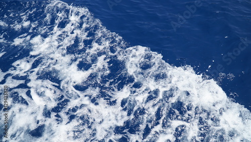Blue sea surface with waves, background