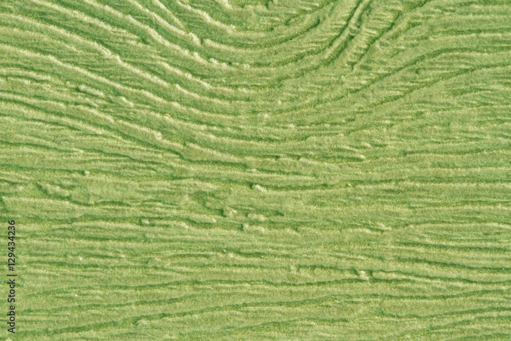 Green paper texture, dark background Green paper texture, dark background