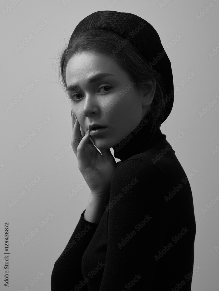 Dramatic black and white portrait of young beautiful girl with freckles ...