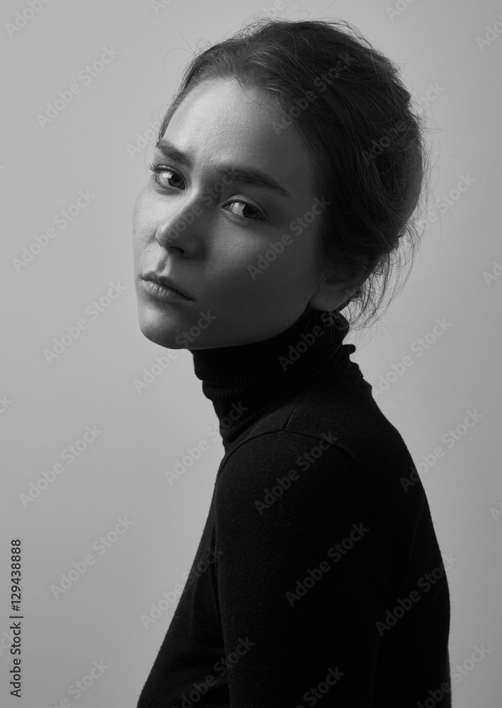Dramatic black and white portrait of young beautiful girl with freckles ...