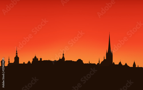 Tallinn city sunset skyline - dark outline against bright sky