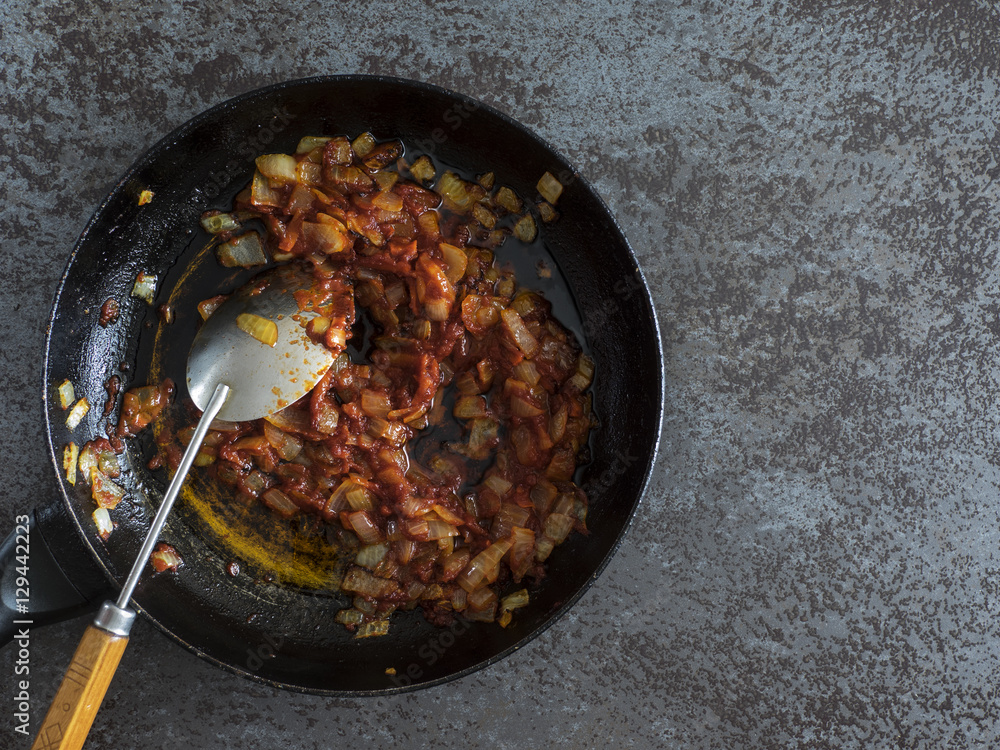 Stewed carrot and onion on pan Stewed carrot and onion on pan