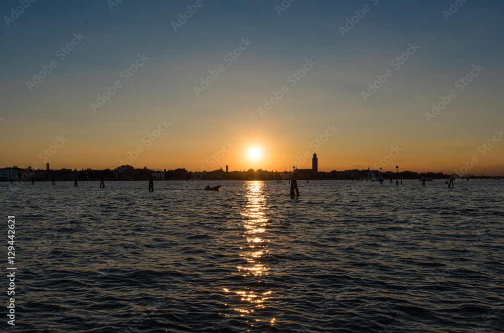 Venice (Italy) - The landscape of city on the sea, at sunset