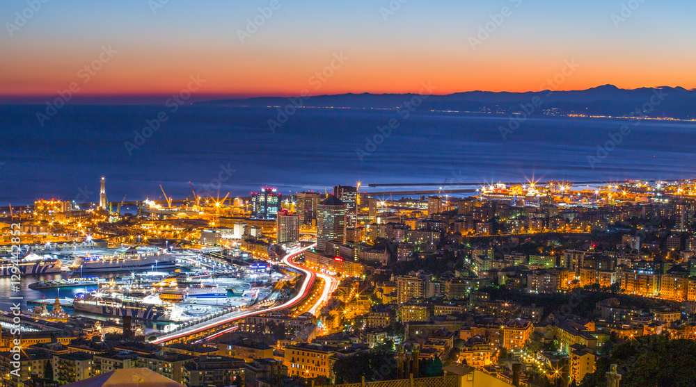 GENOA, ITALY, OCTOBER 27, 2016 - Aerial view of Genoa, Italy, the harbor with the causeway by night / Genoa, October 27, 2016 Italy, Europe