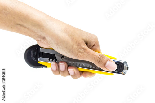 hand holding cutter, sharped knife