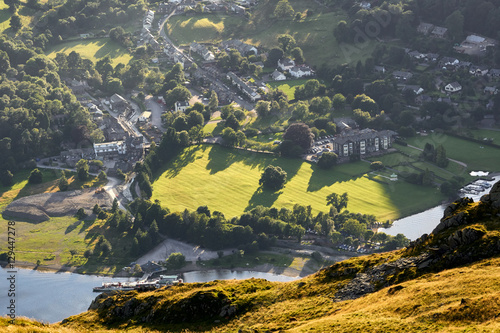 Sun setting over Lake District village of Glenridding at sunset. photo