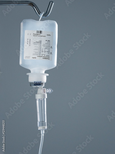 Hospital saline IV Drip for patient after surgery photo