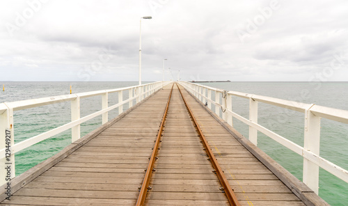 Historic Busselton Jetty in Western Australia  longest timber pier in the Southern Hemisphere  with railway line.