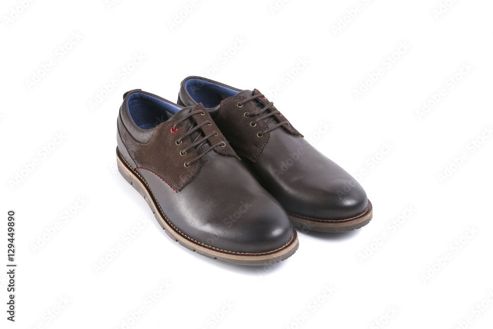 male shoes in brown leather on white background, isolated product, top view male shoes in brown leather on white background, isolated product, top view