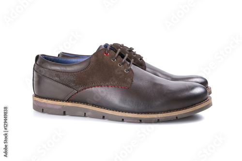 male shoes in brown leather on white background, isolated product, top view