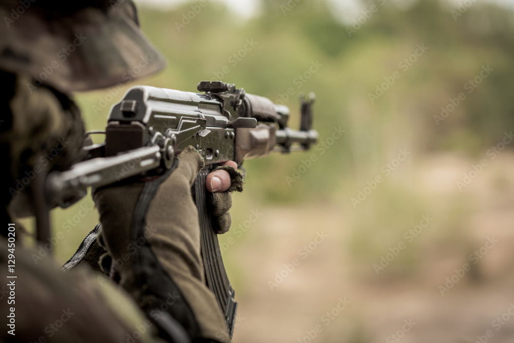 Marine aiming from machine gun Marine aiming from machine gun