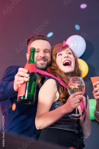 Man holding bottle of champagne