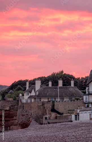 House with a stone fence on the shore of the English Channel in Sidmouth. Devon. England