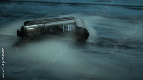 vaporizer on a blue background photo