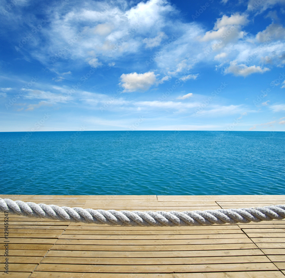 Fototapeta premium Wood, blue sea and sky