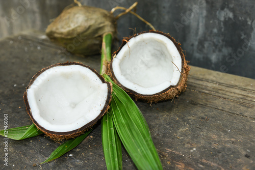 Coconut halves with shell very popular nut in Kerala India used to make oil for Ayurveda massage and milk for curry 