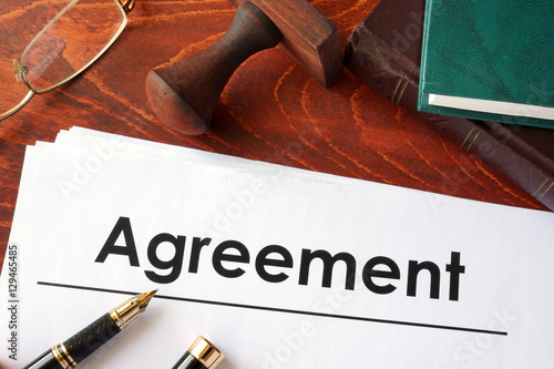 Agreement form on an office table. photo