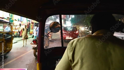 Shot of Chennai traffic through rickshaw windshield at night