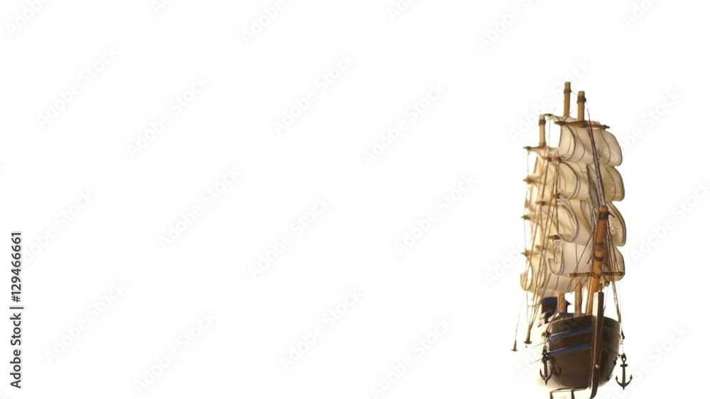 Model sailboat on white background. Model sailboat on white background.