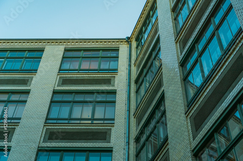 vintage colored brick building in low angle view