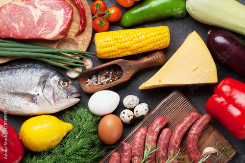 Vegetables, fish, meat and ingredients cooking