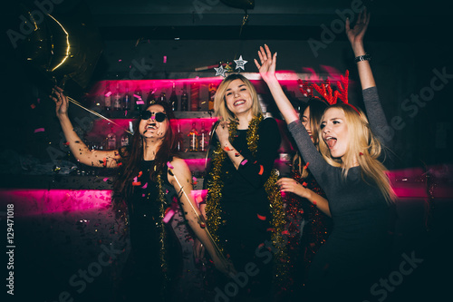 Young woman at club having fun. New year party 